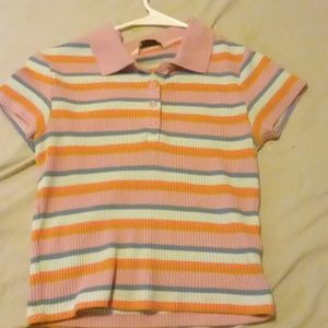 I am selling a size Medium crop t shirt. It is multicolor.